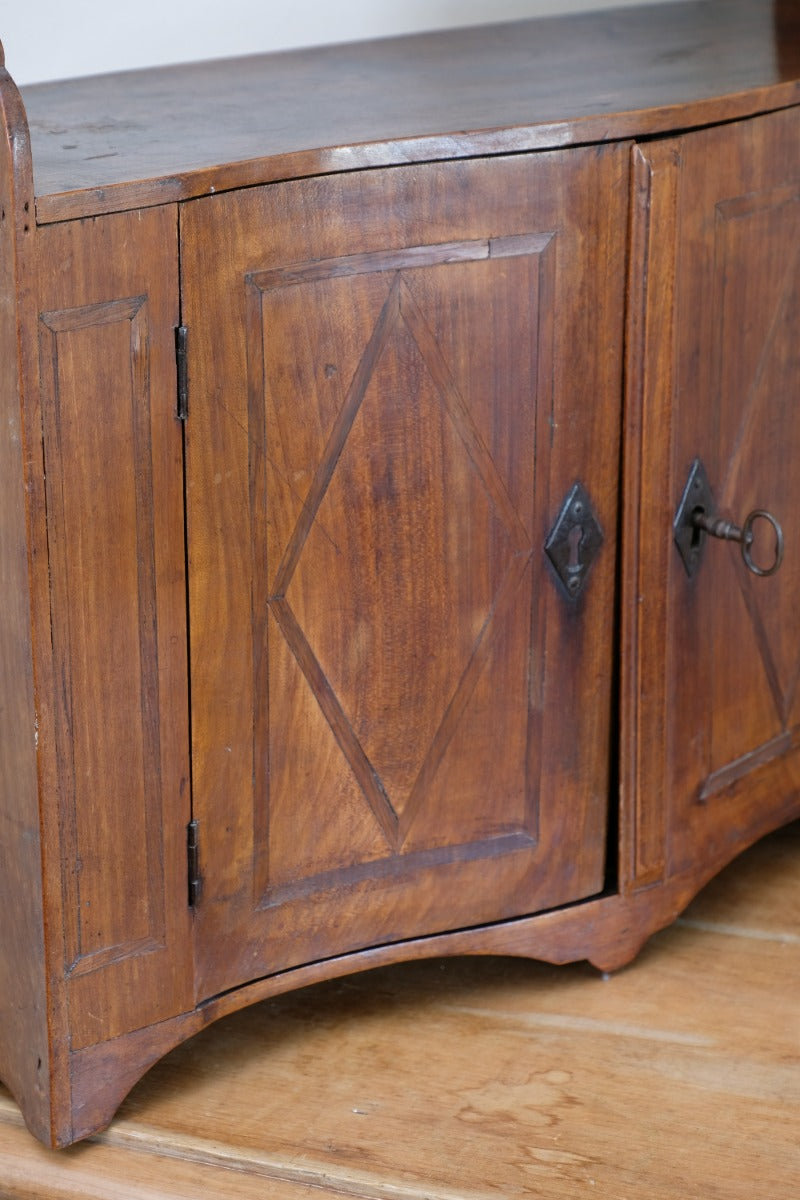 parquetry inlaid cabinet door detail