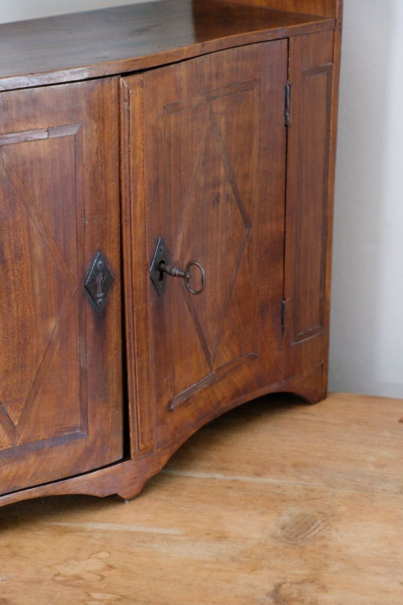original lock and key on antique cabinet