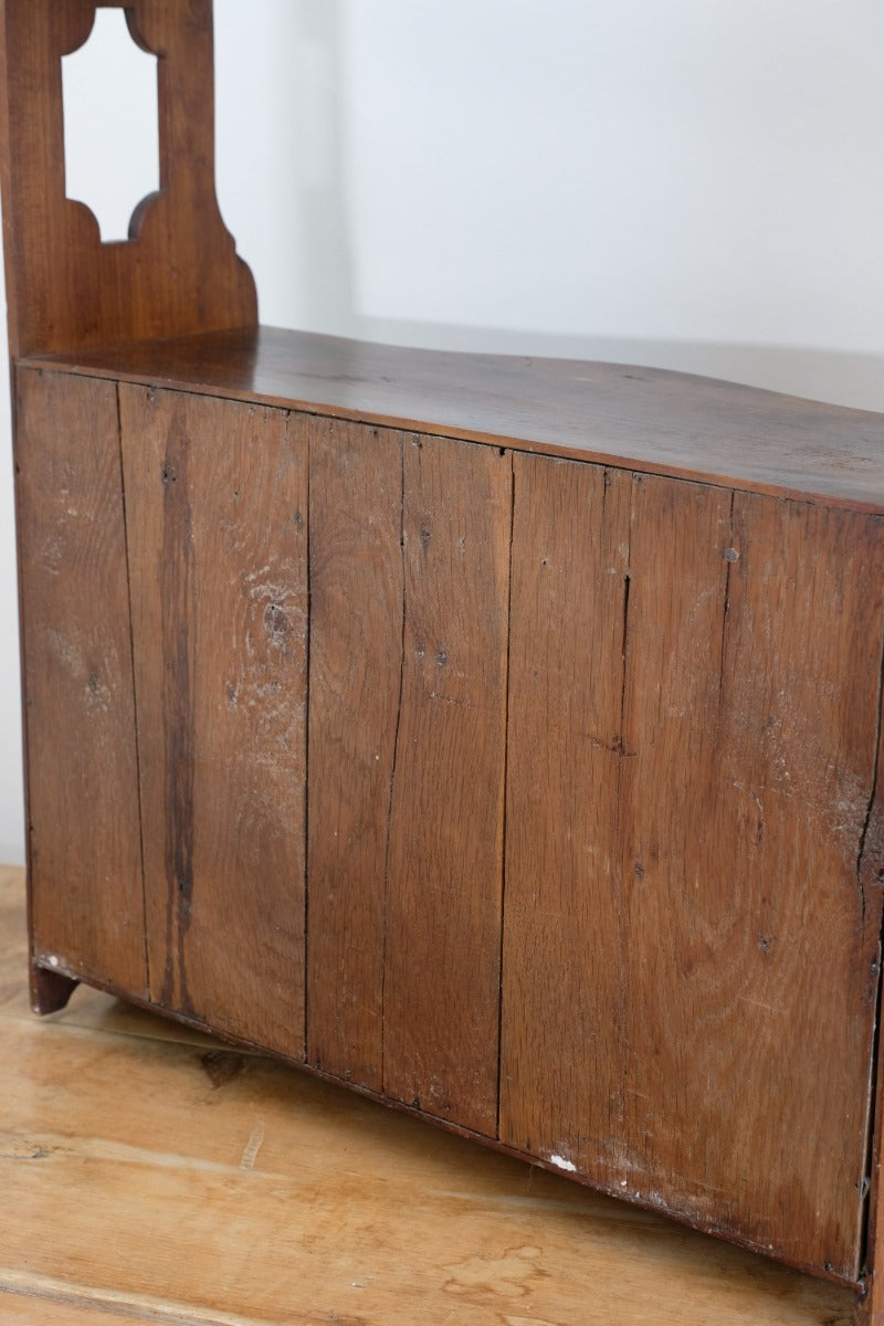 back of the serpentine inlaid wall cabinet fruitwood