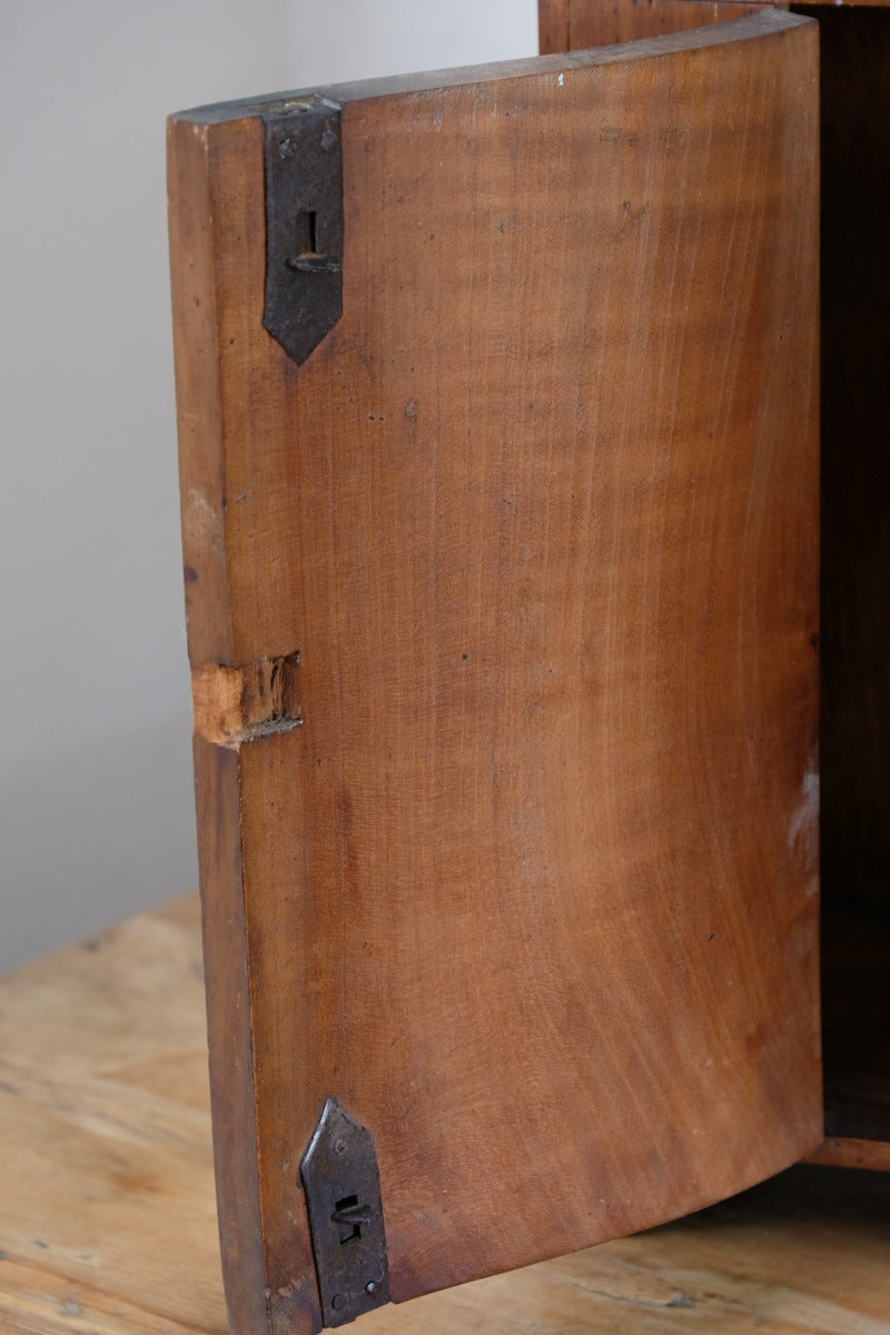 locks of the serpentine inlaid wall cabinet fruitwood