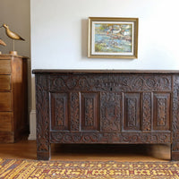carved oak storage chest