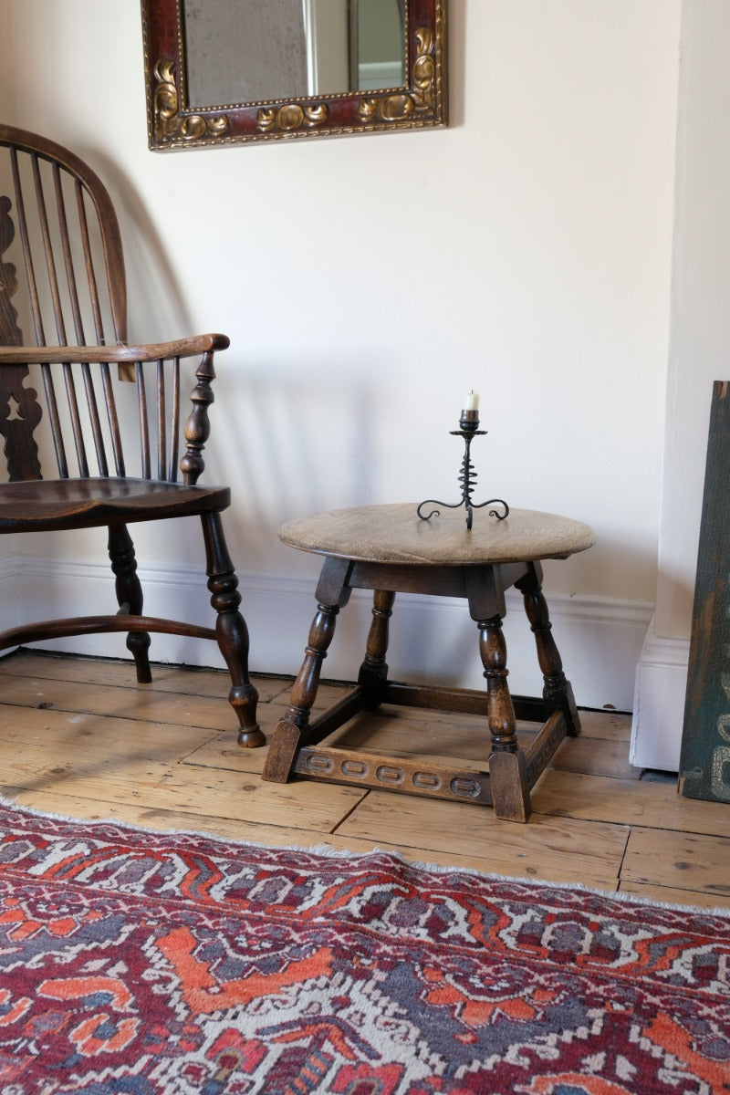 1950s carved oak Priory low round stool table