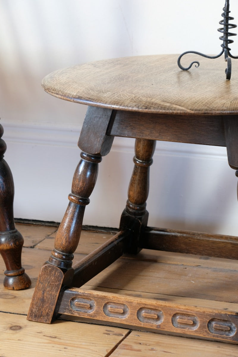 1950s carved oak Priory low round stool table