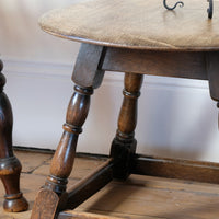1950s carved oak Priory low round stool table