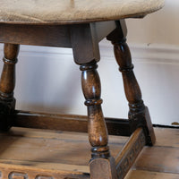 1950s carved oak Priory low round stool table