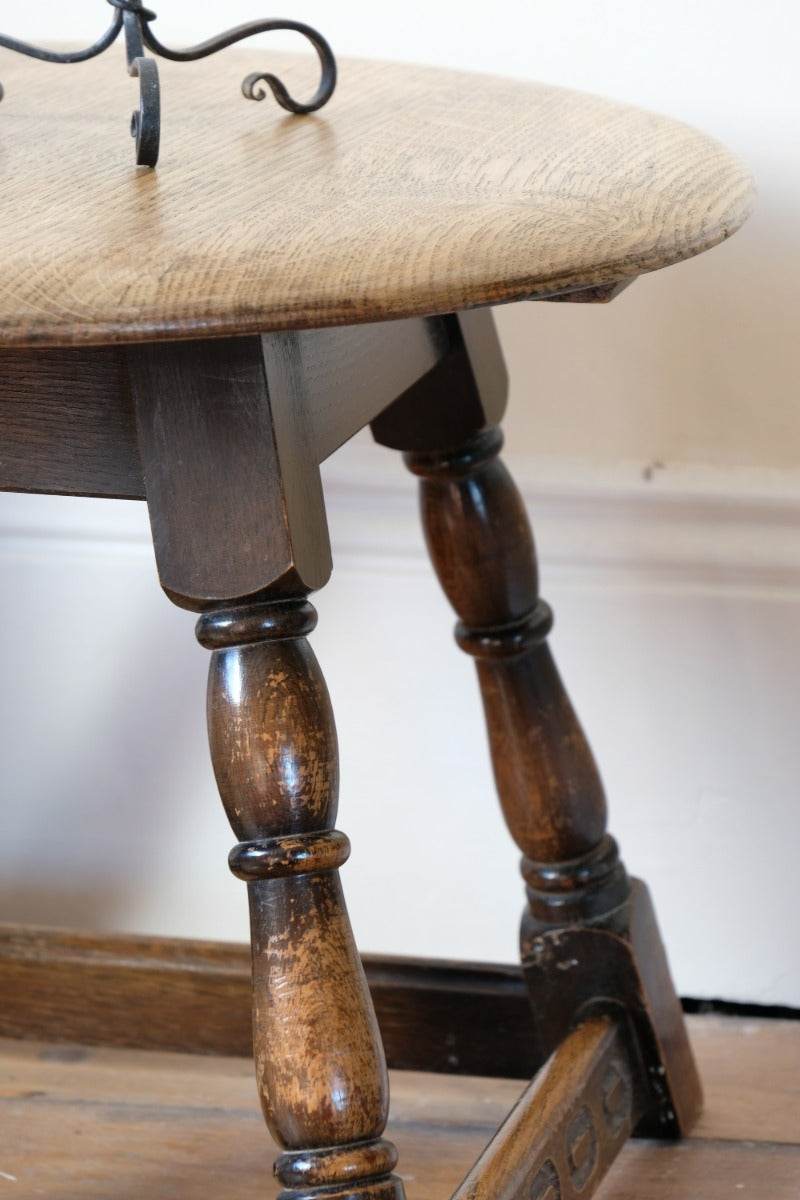 1950s carved oak Priory low round stool table