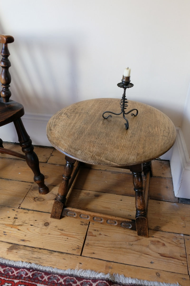 1950s carved oak Priory low round stool table