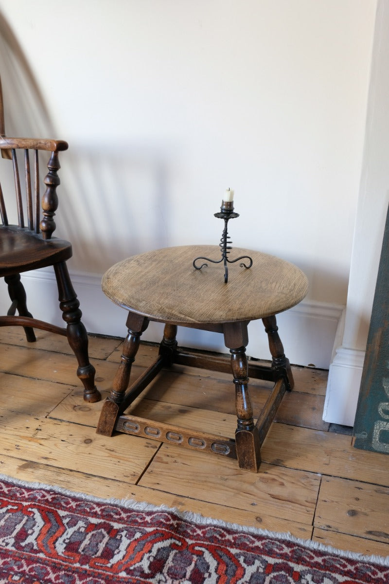 1950s carved oak Priory low round stool table