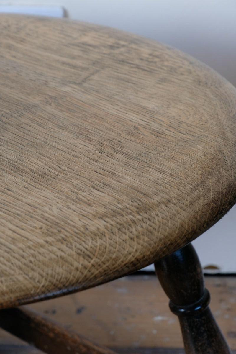 1950s carved oak Priory low round stool table