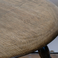 1950s carved oak Priory low round stool table