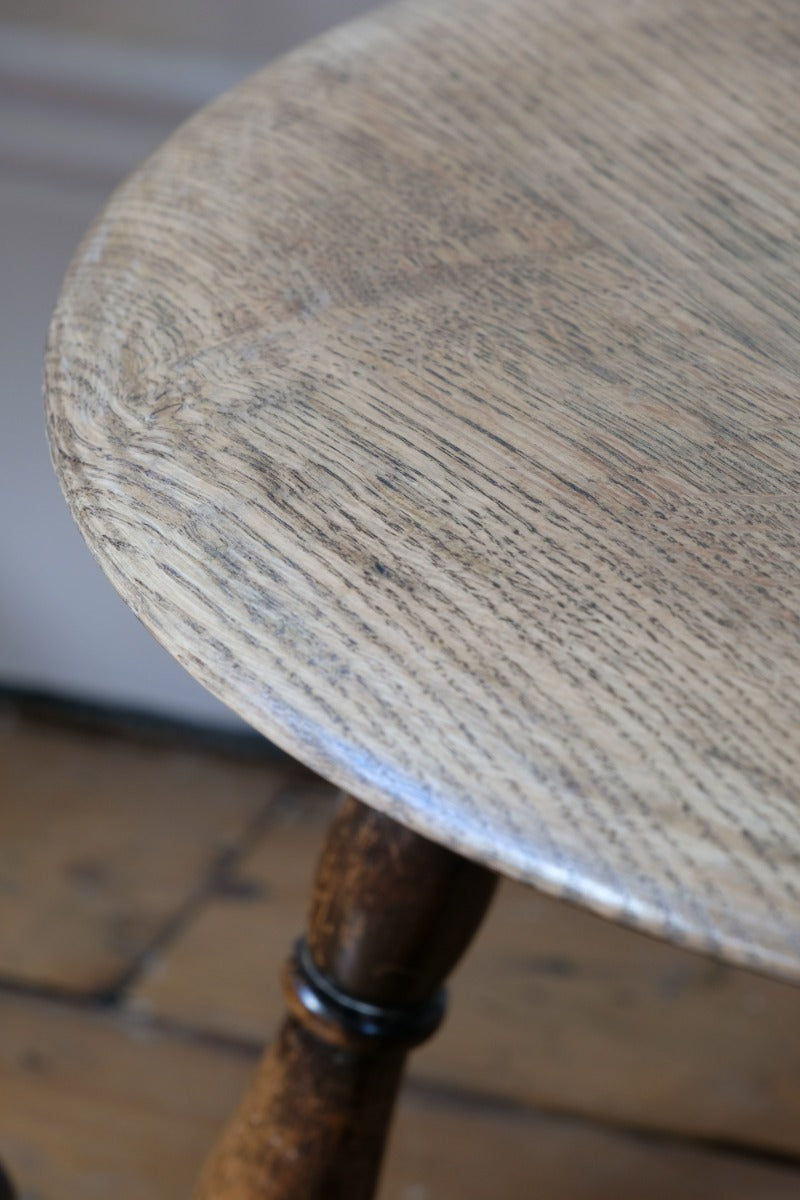 1950s carved oak Priory low round stool table