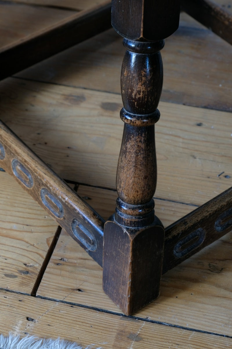 1950s carved oak Priory low round stool table