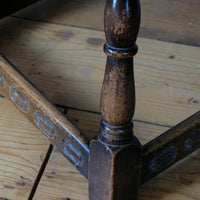1950s carved oak Priory low round stool table