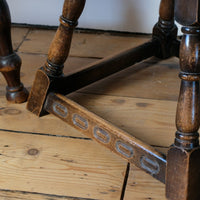 1950s carved oak Priory low round stool table