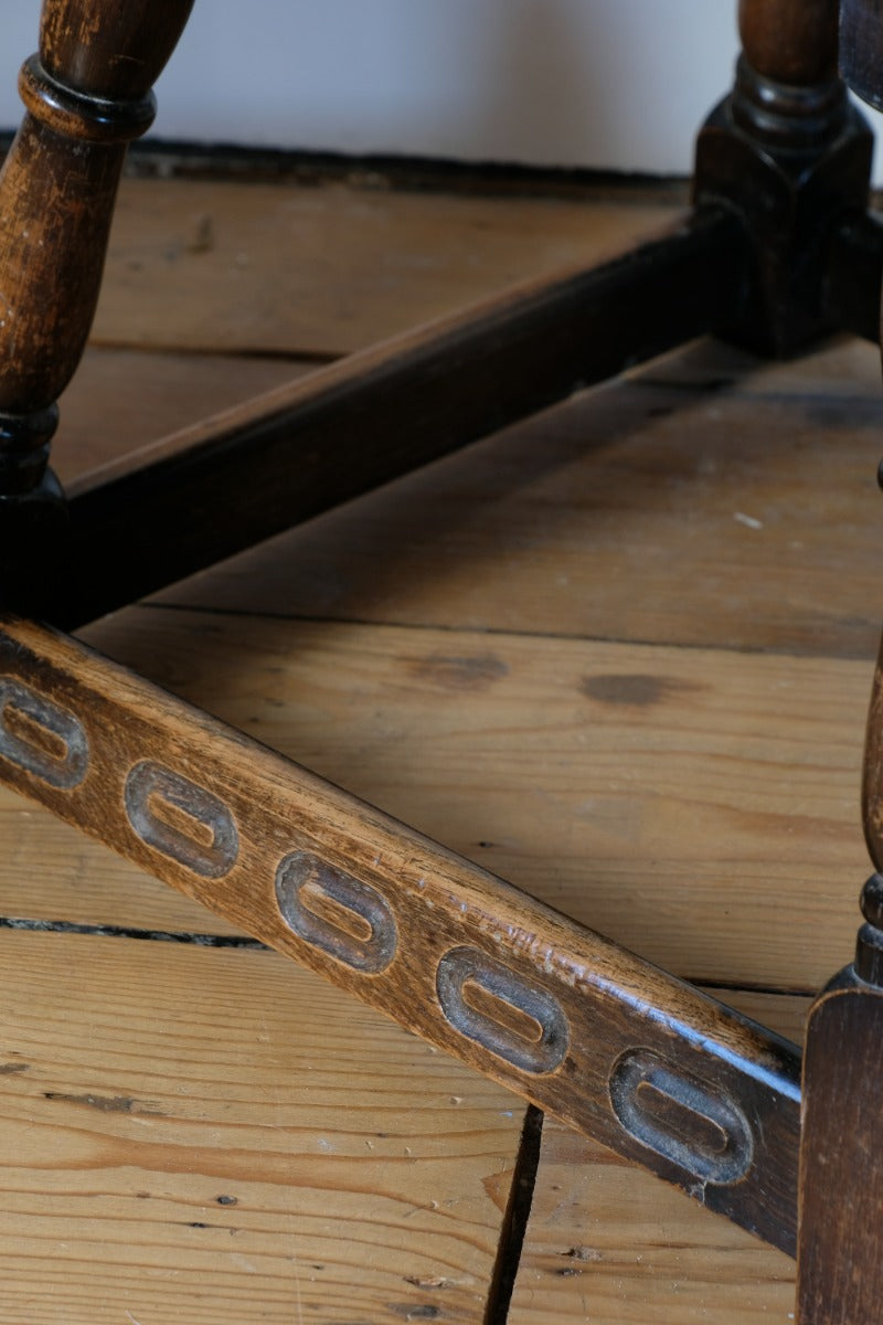 1950s carved oak Priory low round stool table