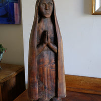 Antique carved sculpture statue of the Madonna