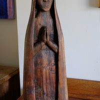 Antique carved sculpture statue of the Madonna