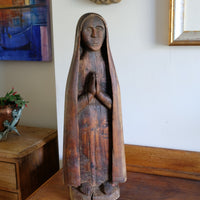 Antique carved sculpture statue of the Madonna