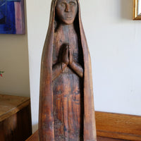 Antique carved sculpture statue of the Madonna