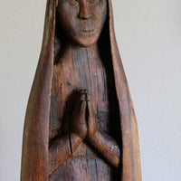 Antique carved sculpture statue of the Madonna