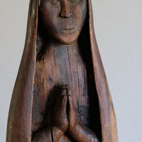 Antique carved sculpture statue of the Madonna