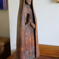 Antique carved sculpture statue of the Madonna
