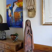 Antique carved sculpture statue of the Madonna