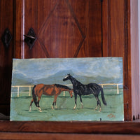 Early 1900s naïve oil painting of two horses mounted on oak panel