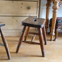 Antique elm and ash farmhouse stool with hand hole, circa 1860"
"Rustic 19th century wooden stool with turned baluster legs