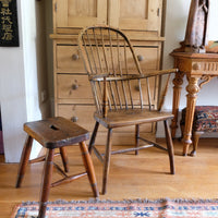 Antique elm and ash farmhouse stool with hand hole, circa 1860"
"Rustic 19th century wooden stool with turned baluster legs