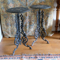 Pair of ornate cast iron tripod tables Circa 1900s