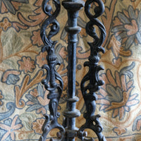 Antique ornate cast iron tripod tables circa 1900s matching pair