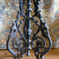 Antique ornate cast iron tripod tables circa 1900s matching pair