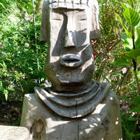 Hand carved naïve folk art wooden bust of a mythical man with weathered patina