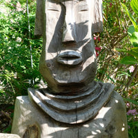 Hand carved naïve folk art wooden bust of a mythical man with weathered patina