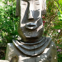 Hand carved naïve folk art wooden bust of a mythical man with weathered patina