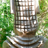 Hand carved naïve folk art wooden bust of a mythical man with weathered patina