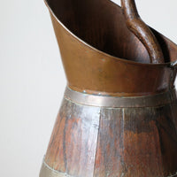 Large 19th-century oak and brass cider jug used as a walking stick and umbrella stand
