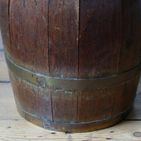 Large 19th-century oak and brass cider jug used as a walking stick and umbrella stand