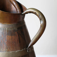 Large 19th-century oak and brass cider jug used as a walking stick and umbrella stand