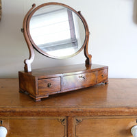 Flamed Mahogany Table Top Oval Mirror With Three Bow Fronted Drawers