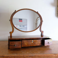 Flamed Mahogany Table Top Oval Mirror With Three Bow Fronted Drawers