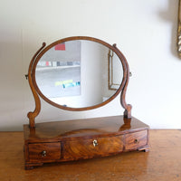 Flamed Mahogany Table Top Oval Mirror With Three Bow Fronted Drawers