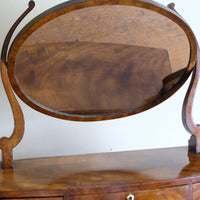 Flamed Mahogany Table Top Oval Mirror With Three Bow Fronted Drawers