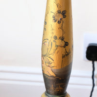 Close up of a detail artwork of a Chinoiserie Giltwood Standard Lamp with Painted Turned Column