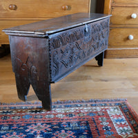 Charles II six-plank oak coffer chest with carved initials E.H., England c.1640–1660
