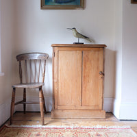 Victorian shallow pine storage cupboard front view