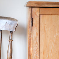 Decorative profile edge on antique pine cupboard