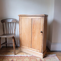 Victorian shallow pine storage cupboard front view