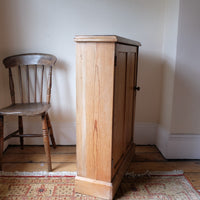 Victorian shallow pine storage cupboard side view